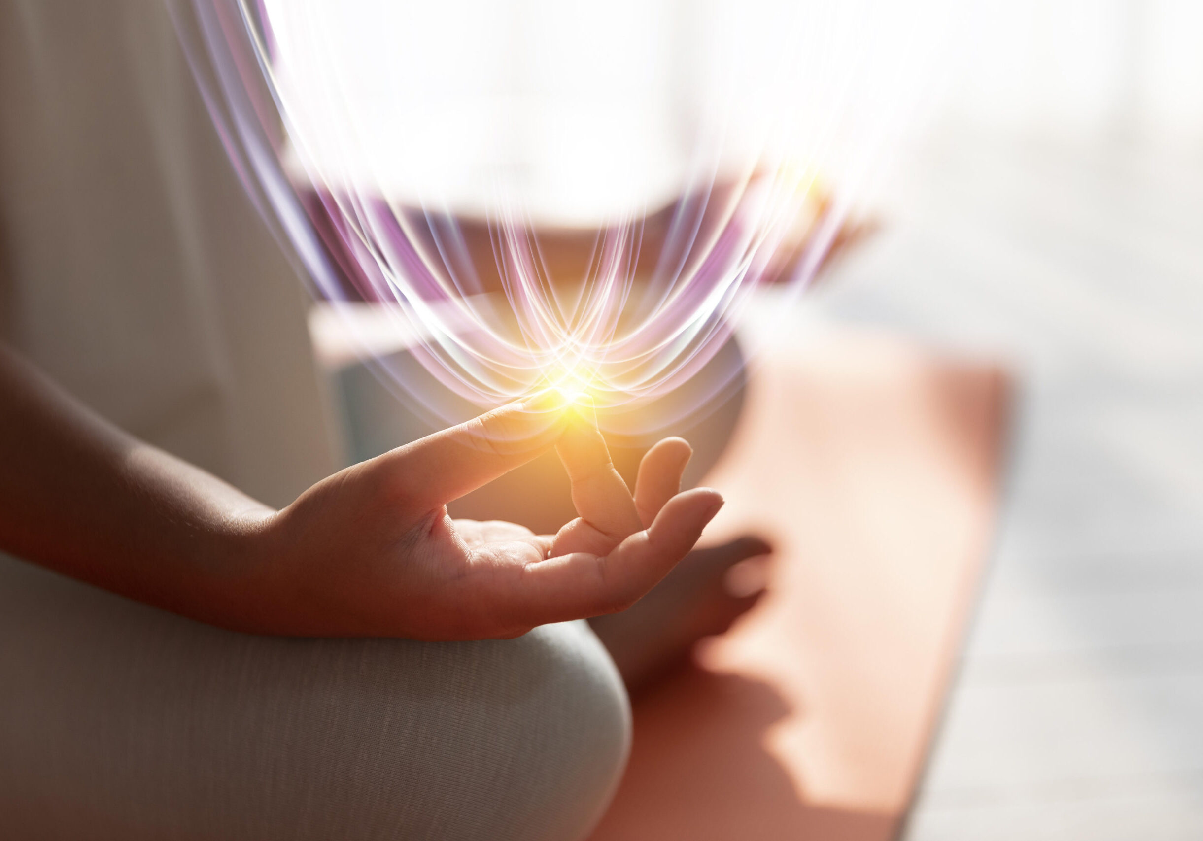 Adult meditating in soft light, mindfulness and wellness approaches used in therapy